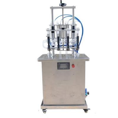 China Semi Automatic Beverage 5-500ml Soap Whiskey Cosmetics Liquid Lemonade Machinery Vacuum Bottling Filling Machine for sale