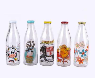 China Freshness Preservation CCP738K31 Hot Sale 1L Round Glass Milk Bottle With Lid And Metal Decal Printing for sale