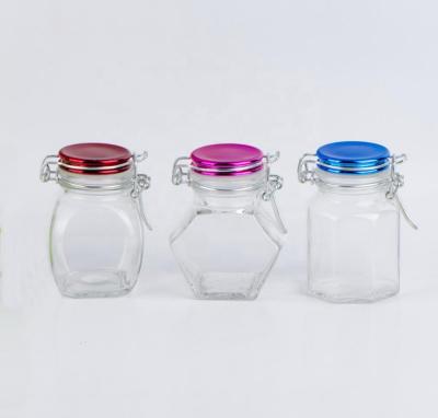 China SP01PT 100ml Small Glass Spice Spice Jar With Clip Lid Painted With Color for sale