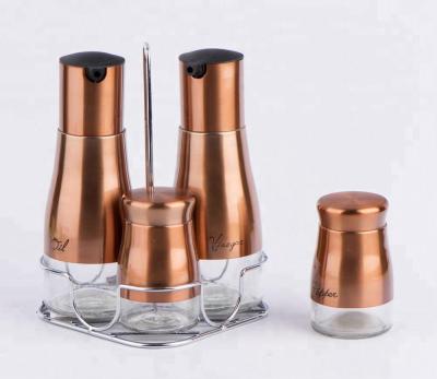 China Freshness Preservation TW1039B2 4pcs Oil Vinegar Salt Pepper Glass Set With Wrap And Metal Stand for sale