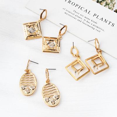 China Weihao Fashion Retro Retro Cool Gold Jewelry Romantic Tassel Alloy Earrings Hot Selling Stud Earrings for sale