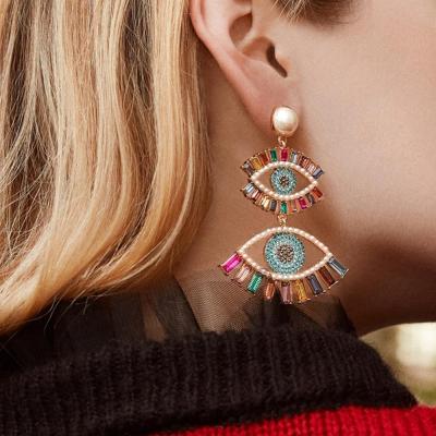 China Retro TRENDY Hyperbole Evil Eyes Dangle Earrings Long Personalized Colorful Crystal Rhinestone Eyes Shape Dangle Earrings for sale