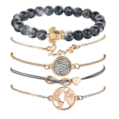 China FASHIONABLE Five Pieces Set Gold Turtle World Map Heart Bracelet Gray Stone Beads Bracelet Set For Women for sale