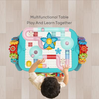 China Hot selling amazon 2 in 1 blueteeth learning table building blocks desk with music and funny toys 55*35*40 cm for sale