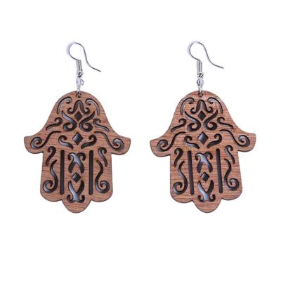 China Polishing Hollowed Out Ethnic Wooden Earrings Set Drop Earring Palm Pattern Afrocentric Geometric Wooden Earring Jewelry for sale