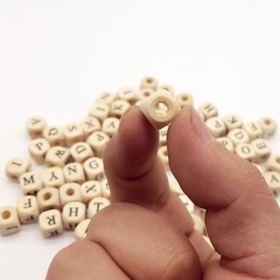 China Wholesale DIY Loose Wooden Beads Customize For Making Cube Natural Dies Color Letter Wooden Bead With Hole Cheap For DIY Toy for sale