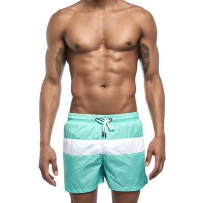 China Mens Designer Swimwear Shorts Contrast Color Beach Anti-UV Swim Trunks With Back Pocket for sale