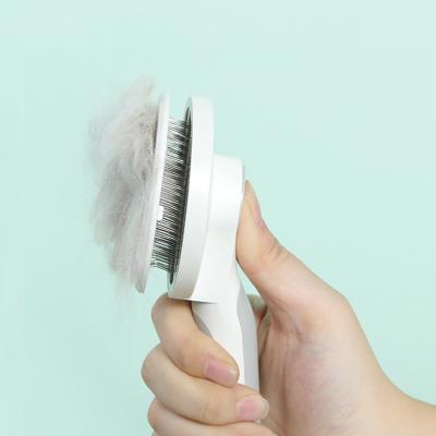 China Factory Sale Easy-use Self Cleaning Stocked Press to Remove Battery-Free Pet Hair Grooming Comb for Cats and Dogs for sale