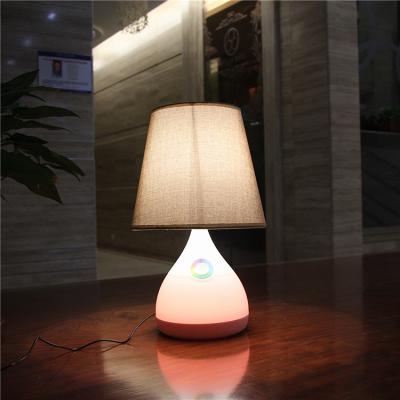 China Combine white light with plastic beautiful appearance 7 color stremline light design LED portable table lamp with RGB base changing light for sale