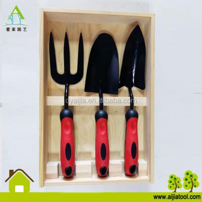 China Carbon Steel Garden Tool Kit With Color Box PDQ Wood Weeder Fork Trowel for sale