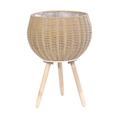 China New Fashion Modern Hot Sale Plastic Rattan Planter 3 Legs Weaving Flower Pot for sale