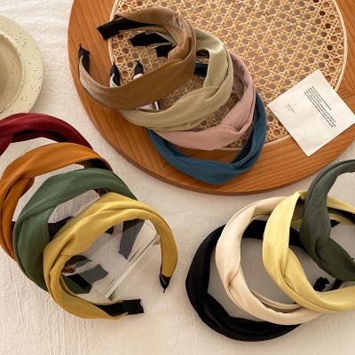 China CLARMER environmentally friendly fashion new hair accessories simple designer new solid color PU leather wide cross headband for sale