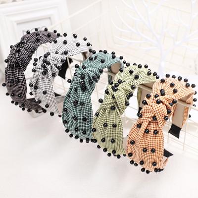 China CLARMER fashion new winter fashion women hair accessories knot black pearl beads latticework grid knot headband for sale