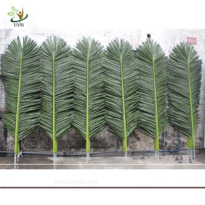 China UVG wholesale green ornaments plastic artificial palm tree leaves for outdoor home deco PTR014 for sale