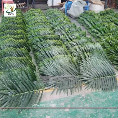 China UVG cheap fake indoor plastic palm tree leaves wholesale for party and events decoration PTR062 for sale