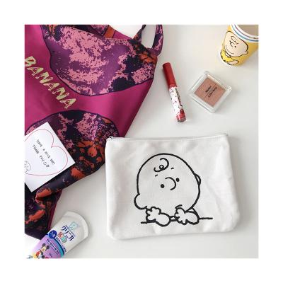 China Recyclable Beauty Cotton Cosmetics Makeup Bag With Cartoon Dog Snoopy Print for sale