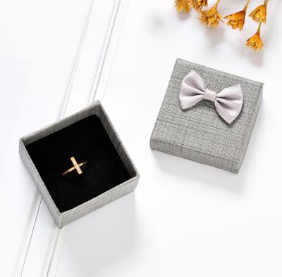 China Recyclable Best Selling Small Bow Colorful Paper Packaging Mini Earring Gift Announcement Box With Logo for sale