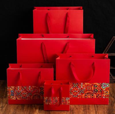 China 12*5.7*16cm Recyclable Promotion Customize Gift Bag Kraft Paper Bag Shopping Gift Custom Paper Bag for sale