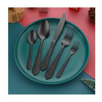 China Sustainable High Quality Knife Fork Spoon Set Black Carved Stainless Steel 5 Pcs Handle Cutlery Set for sale