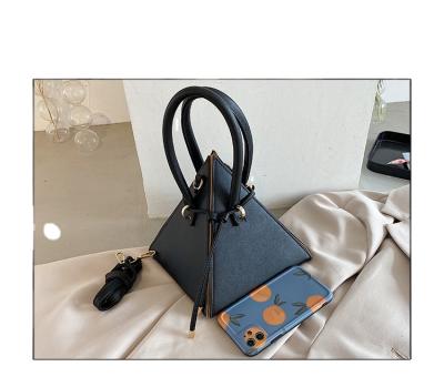 China High Quality Fashion Solid Color PU Triangle Cross - Body Handbags For Women Unique Luxury New In 2021 for sale