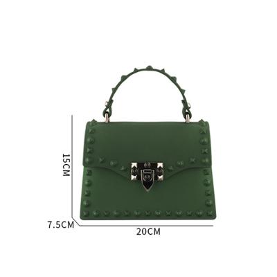 China 2021 New Fashion Matte Pvc Jelly Ladies Hand Bag With Rivet Pendant Single Shoulder Purses And Handbags for sale