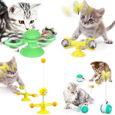 China Amazon Stocked Best Selling Pet Toys Cat Windmill Toy Funny Massage Cat Dog Teeth Cleaning Toys Rotatable for sale