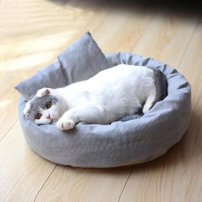 China Popular Pets Winter Nest Bed Stored Washable Warm Comfortable Dogs Cats Bed for sale