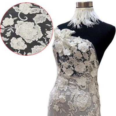 China Viable White Bridal 3D Flowers Lace French Mesh Floral Embroidery Net Tulle Fabric Transparent Textiles For Wedding Dress Party Dress for sale