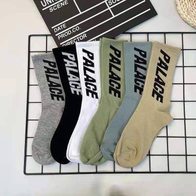 China Breathable C033 2021 New Men's And Women's New Mid Tube Statistical Letters White Men's Mid Tube Sports Basketball Socks for sale