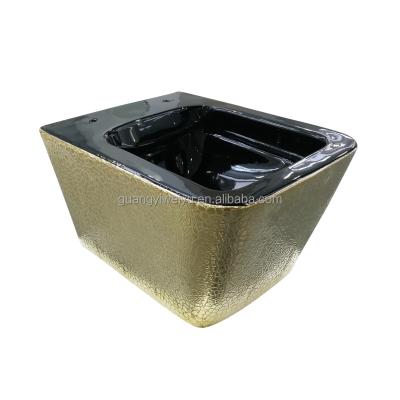 China Luxury Gold Nobility Embossing Hidden Cistern OEM High Temperature Black Gloss WC Rectangular Wall Hung Toilet For Bathroom for sale