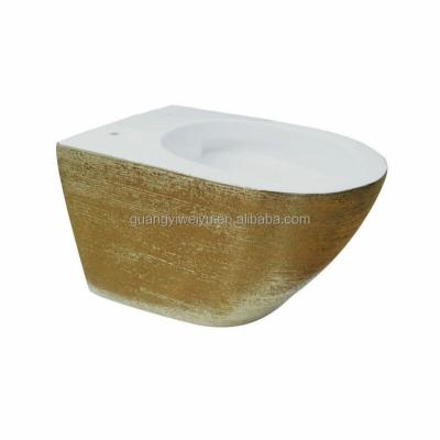 China Good Quality Hidden Cistern Ceramic Wall Hung Brushed Gold Plated Rimless Hanging Toilet Ring Toiletries For Dubai Hotel Bathroom for sale