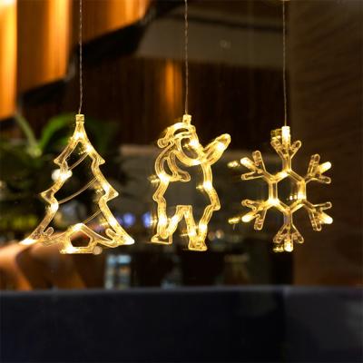 China Hot Selling Christmas Decoration Christmas Light Jingle Bell Star Deer Snowflakes Santa Claus Window Holiday Suction Cup Decorative Lamp for sale