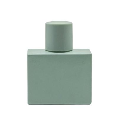 China Generous Luxury Personal Care 50ml Square Modern Baby Blue Glass Perfume Bottle Customized Stamping for sale