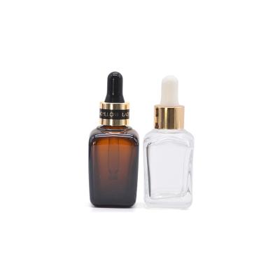 China Cosmetic Hot Selling Premium Essential Oil Glass Bottle With Dropper Cap for sale