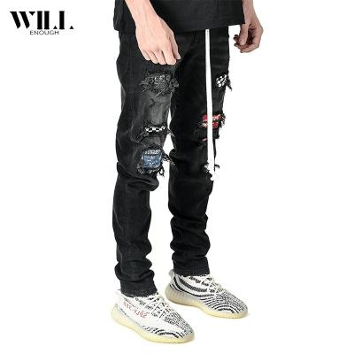 China New breathable men's high-end slim jeans ripped small-foot jeans men's jeans for sale