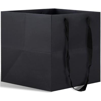 China Handmade Black Kraft Paper Large Paper Bag For Retail Tote Bags Accept OEM ODM for sale