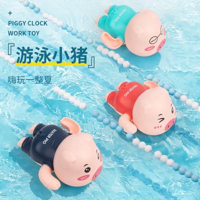 China educational & Funny Swimming Pig Toys Baby Pool Bathtub Floating Toys For Kids Toddlers Wind Up Mobile Bath Toys for sale