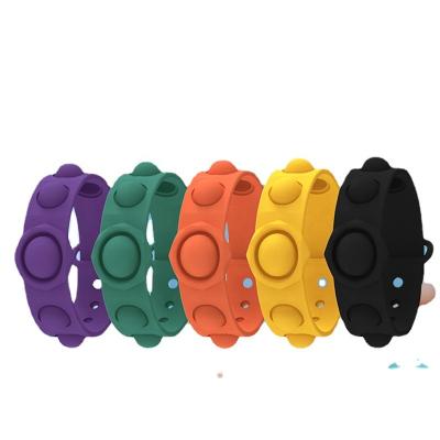 China Toy Pressure Anxiety Relief Funny Educational Finger Squeezing Wearable Toys Rainbow Silicone Wristband for sale