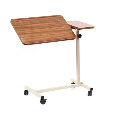 China Easy Assemble Hospital Wooden Medical Overbed Table With Tilting Board And Four Casters With Brakes for sale