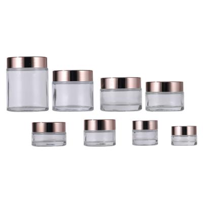 China 5g 10g 15g 20g 30g 50g 60g 100g Clear Glass Cosmetic Cream Jar With Rose Gold Lid for sale