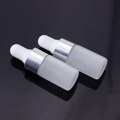 China Personal Care In Stock Sample 1ml 2ml 3ml Tincture Glass UV Proof Frosted Bottles With Silver Dropper Lid for sale