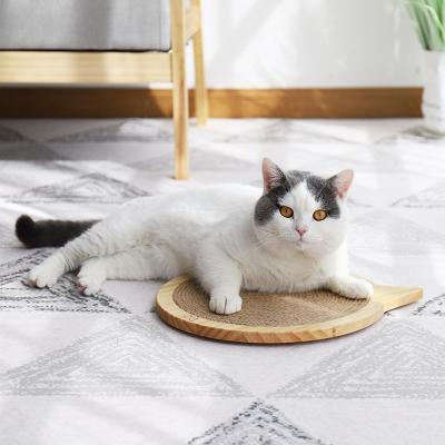 China Cat Playing Cat Scratch Board Cat Head Solid Wood Sisal Mat Suction Cup Claw Grinder Cat Scratching Board for sale