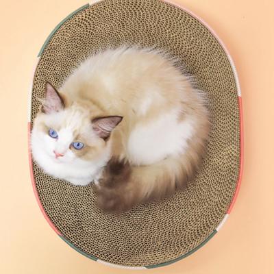 China High Density Wear-resistant Plastic Shell Corrugated Scratcher Cardboard Pet Cat Toy Cat Scratch Board Round Cat Playing Cat Scratch Board for sale