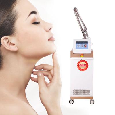 China Newest CO2 Laser Pigment Removal CO2 Laser Machine CO2 Laser Equipment Partial/Partial Skin Tighten Acne Treatment for sale