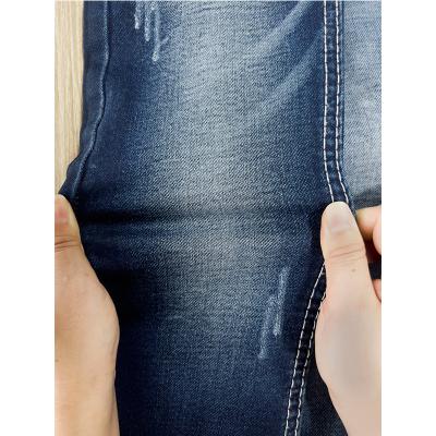 China Breathable Foshan Original Manufacturer Stoned Wash Indigo Rope Dyed Edge Denim Fabric Swatch for sale