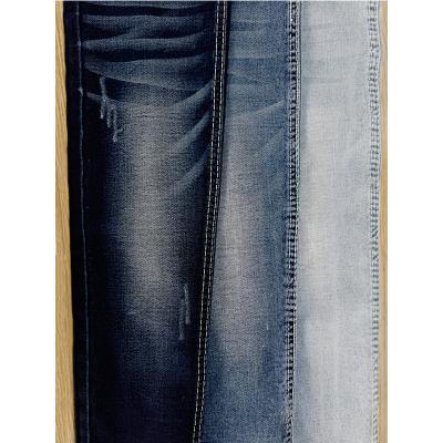 China Breathable High Quality Indigo 12oz Elastin Running Jeans Fabric Made In Foshan for sale