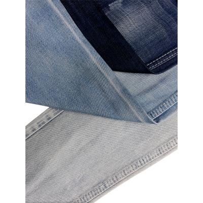 China Breathable Top Grade 10oz Textiles Stock Lot Recycled Denim Fabric 100% Raw Ten Cel Denim Fabric for sale