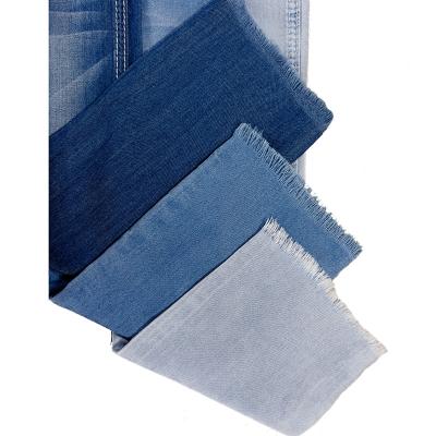 China Factory Breathable Stock Ribbed Twill Thin Cotton Woven Denim Yard Fabric For Shirt Pants for sale