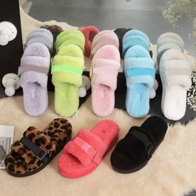 China 2021 Fashion Trend Ins Design Warm Winter Woolen Warm Indoor Slippers Sheepskin Fluffy Slippers for sale