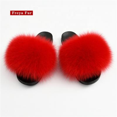 China Fashion Trend Luxury Summer Outdoor Open Toe Natural Fluffy Fox Fur Slides For Women for sale